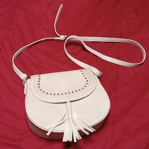 Beige cross body purse with tassle